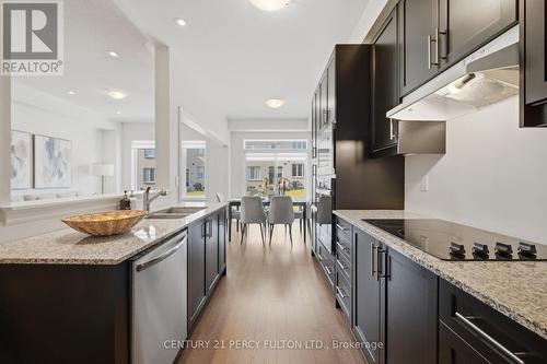 32 Mountainside Crescent, Whitby, ON - Indoor Photo Showing Kitchen With Double Sink With Upgraded Kitchen