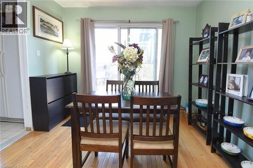 Dining room featuring hardwood flooring and patio doors to back deck - 1345 Colonsay Drive, Burlington, ON - Indoor Photo Showing Dining Room