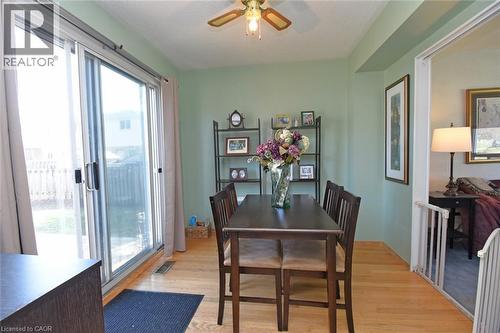 Dining room with ceiling fan and light wood-style flooring - 1345 Colonsay Drive, Burlington, ON - Indoor Photo Showing Dining Room