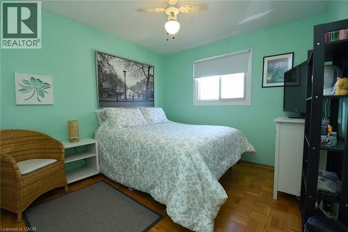 Bedroom featuring parquet floors and a ceiling fan - 1345 Colonsay Drive, Burlington, ON - Indoor Photo Showing Bedroom