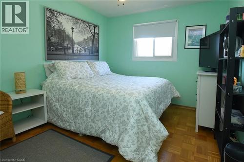 Bedroom featuring parquet flooring and ceiling fan - 1345 Colonsay Drive, Burlington, ON - Indoor Photo Showing Bedroom