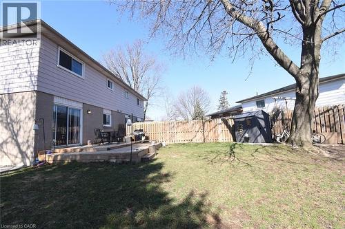 Large fenced backyard with wooden deck and shed - 1345 Colonsay Drive, Burlington, ON - Outdoor With Deck Patio Veranda