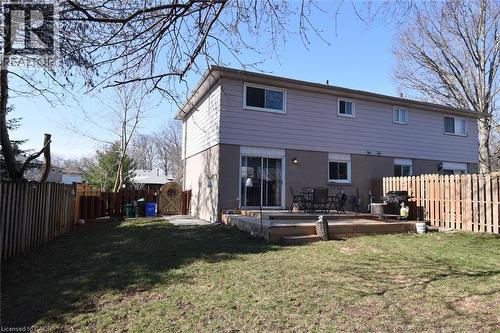 Back of house featuring a fenced backyard and wooden deck - 1345 Colonsay Drive, Burlington, ON - Outdoor With Deck Patio Veranda