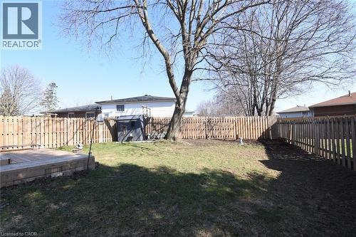 Fenced backyard with a deck and shed - 1345 Colonsay Drive, Burlington, ON - Outdoor