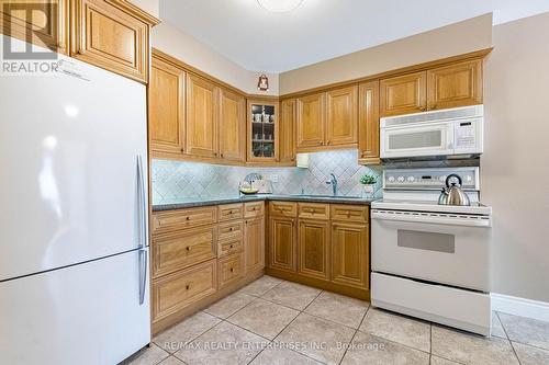 Granite Counter - 3016 Rymal Road, Mississauga, ON - Indoor Photo Showing Kitchen