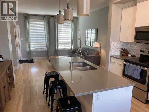 959 Miners Boulevard W, Lethbridge, AB - Indoor Photo Showing Kitchen With Double Sink