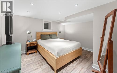 Bedroom with light wood-style floors and recessed lighting - 58 Hohner Avenue, Kitchener, ON - Indoor Photo Showing Bedroom