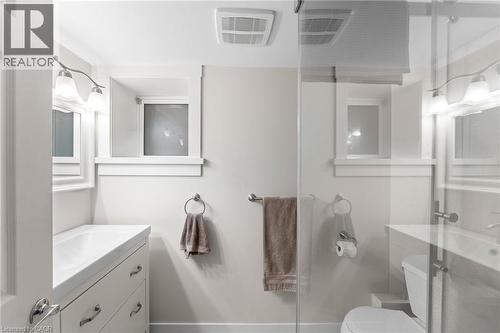 Bathroom with vanity and a shower stall - 58 Hohner Avenue, Kitchener, ON - Indoor Photo Showing Bathroom