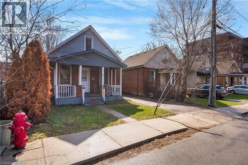 Bungalow-style house with covered porch and a front lawn - 6 Ben Lomond Place, Hamilton, ON - Outdoor With Deck Patio Veranda