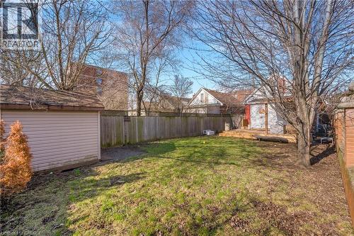 Fenced backyard with an outbuilding - 6 Ben Lomond Place, Hamilton, ON - Outdoor