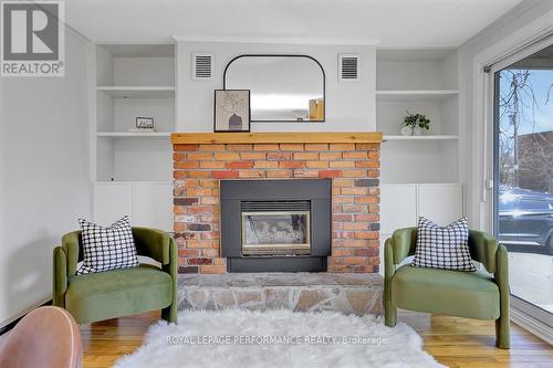 1141 North River Road, Ottawa, ON - Indoor Photo Showing Living Room With Fireplace