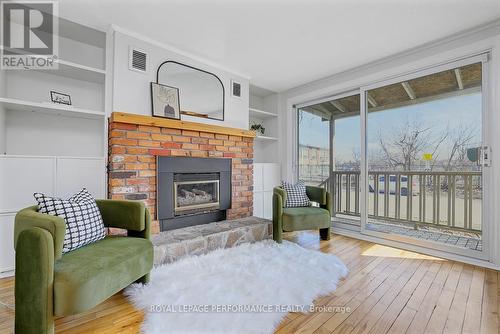 1141 North River Road, Ottawa, ON - Indoor Photo Showing Living Room With Fireplace