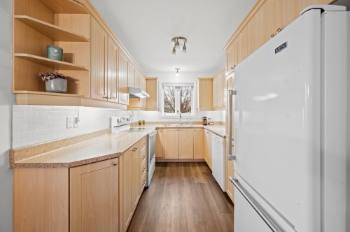 Cuisine - 202-351 Rue Du Clos-Toumalin, Prévost, QC - Indoor Photo Showing Kitchen With Double Sink