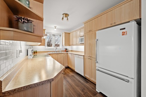 Cuisine - 202-351 Rue Du Clos-Toumalin, Prévost, QC - Indoor Photo Showing Kitchen With Double Sink