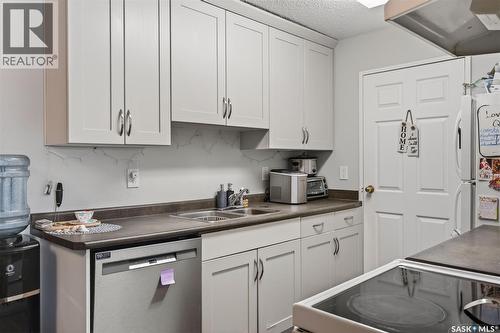 105H 1121 Mckercher Drive, Saskatoon, SK - Indoor Photo Showing Kitchen With Double Sink
