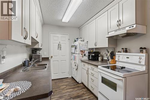 105H 1121 Mckercher Drive, Saskatoon, SK - Indoor Photo Showing Kitchen With Double Sink