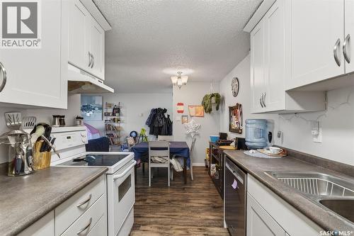105H 1121 Mckercher Drive, Saskatoon, SK - Indoor Photo Showing Kitchen With Double Sink