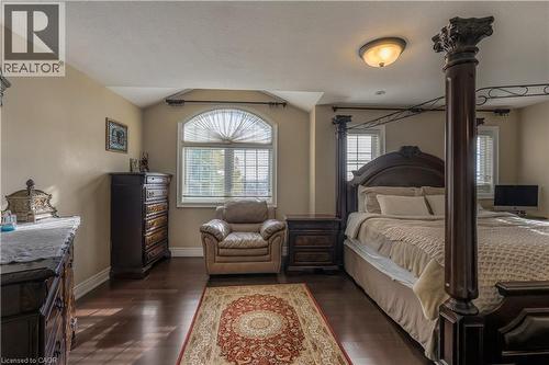 Bedroom with baseboards and dark wood-type flooring - 254 Rymal Road W, Hamilton, ON - Indoor Photo Showing Bedroom