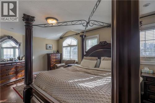Bedroom featuring baseboards and dark wood-type flooring - 254 Rymal Road W, Hamilton, ON - Indoor Photo Showing Bedroom