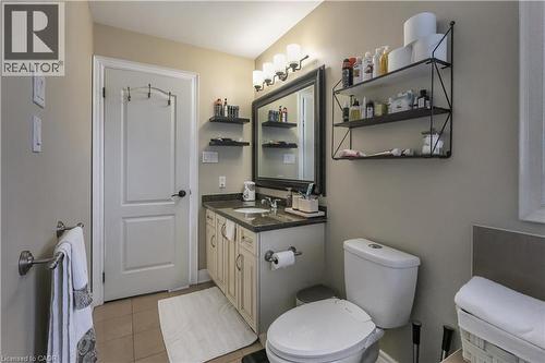 Bathroom featuring vanity and light tile patterned floors - 254 Rymal Road W, Hamilton, ON - Indoor Photo Showing Bathroom
