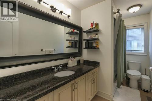 Bathroom with a shower with curtain and vanity - 254 Rymal Road W, Hamilton, ON - Indoor Photo Showing Bathroom