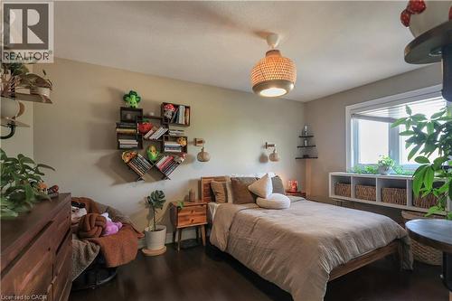 Bedroom featuring dark wood-style flooring - 254 Rymal Road W, Hamilton, ON - Indoor Photo Showing Bedroom