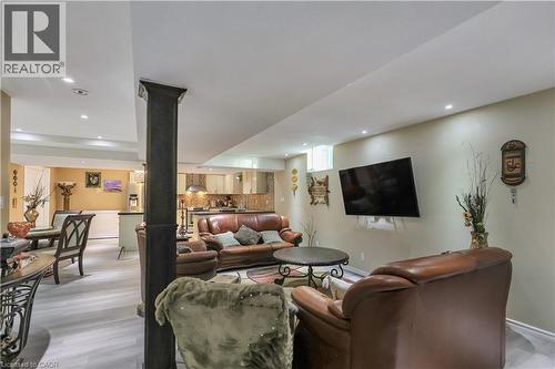 Living room with recessed lighting, light wood finished floors, and ornate columns - 254 Rymal Road W, Hamilton, ON - Indoor