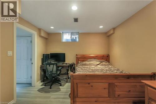 Bedroom featuring light wood-style floors, recessed lighting, and an office area - 254 Rymal Road W, Hamilton, ON - Indoor