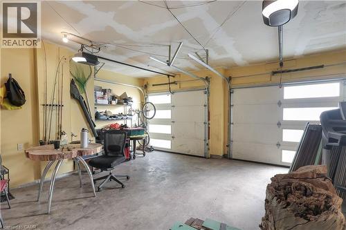 Garage with a garage door opener - 254 Rymal Road W, Hamilton, ON - Indoor Photo Showing Garage