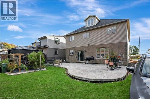 Back of property featuring brick siding and a patio area - 254 Rymal Road W, Hamilton, ON - Outdoor