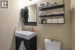 Bathroom featuring toilet and vanity - 