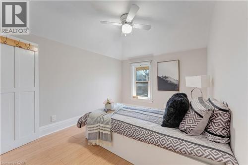 Bedroom with light wood-style floors, ceiling fan, and vaulted ceiling - 24 Onward Avenue, Kitchener, ON - Indoor Photo Showing Bedroom