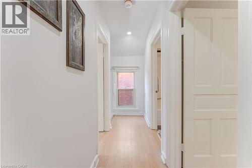 Corridor with light wood finished floors and recessed lighting - 24 Onward Avenue, Kitchener, ON - Indoor Photo Showing Other Room