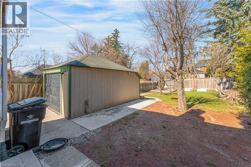 Fenced backyard with an outdoor structure - 24 Onward Avenue, Kitchener, ON - Outdoor