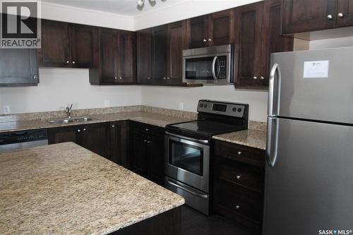 708 537 4Th Avenue N, Saskatoon, SK - Indoor Photo Showing Kitchen With Double Sink