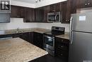 708 537 4Th Avenue N, Saskatoon, SK  - Indoor Photo Showing Kitchen With Double Sink 