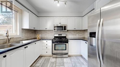 39 Etherington Crescent, Barrie, ON - Indoor Photo Showing Kitchen With Double Sink