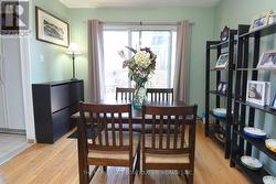 Dining room featuring hardwood floors - 