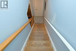 Nice hardwood staircase leading to second floor - 