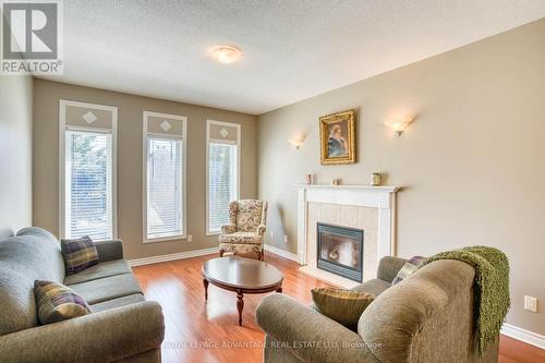 Living room w/warming gas fireplace ... - 15 Antonio Way, Perth, ON - Outdoor With Deck Patio Veranda