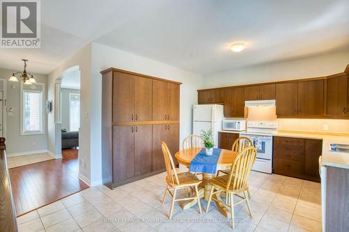 Kitchen w/convenient pantry ... - 15 Antonio Way, Perth, ON - Indoor With Fireplace