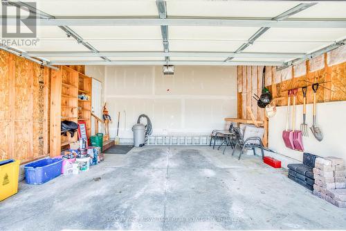 Interior view of double attached garage ... - 15 Antonio Way, Perth, ON - Indoor Photo Showing Laundry Room