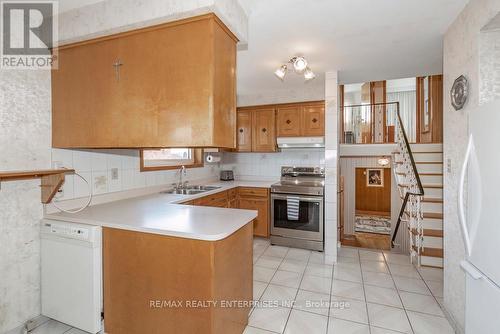 7368 Redstone Road, Mississauga, ON - Indoor Photo Showing Kitchen With Double Sink