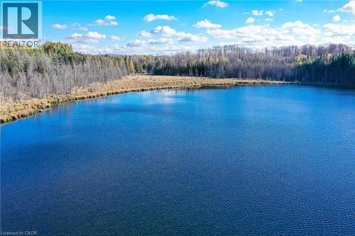 Water view featuring a heavily wooded area - 6361 16Th Line, Minto, ON - Outdoor With Body Of Water With View