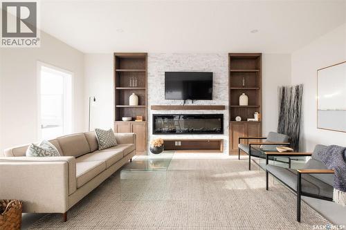 3748 Gee Crescent, Regina, SK - Indoor Photo Showing Living Room With Fireplace