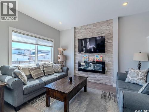114 Germain Court, Saskatoon, SK - Indoor Photo Showing Living Room With Fireplace