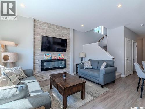 114 Germain Court, Saskatoon, SK - Indoor Photo Showing Living Room With Fireplace