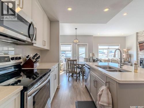 114 Germain Court, Saskatoon, SK - Indoor Photo Showing Kitchen With Double Sink With Upgraded Kitchen
