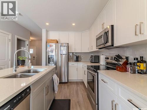 114 Germain Court, Saskatoon, SK - Indoor Photo Showing Kitchen With Double Sink