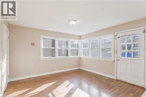View of unfurnished sunroom - 20 East 27Th Street, Hamilton, ON - Indoor Photo Showing Other Room